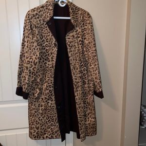 Reversible raincoat solid/animal print size large